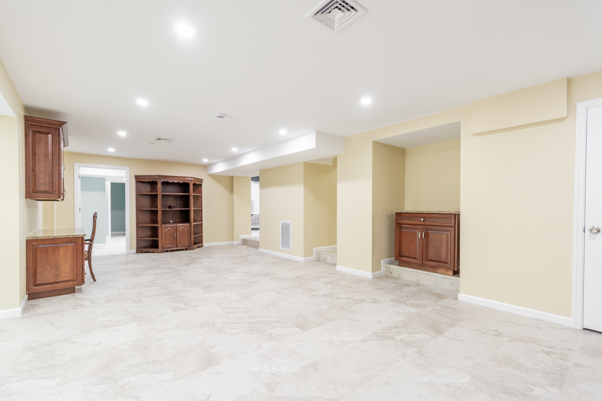 After basement remodeling at Smith Residence in Brookfield CT showing completed basement after flooring and finish work