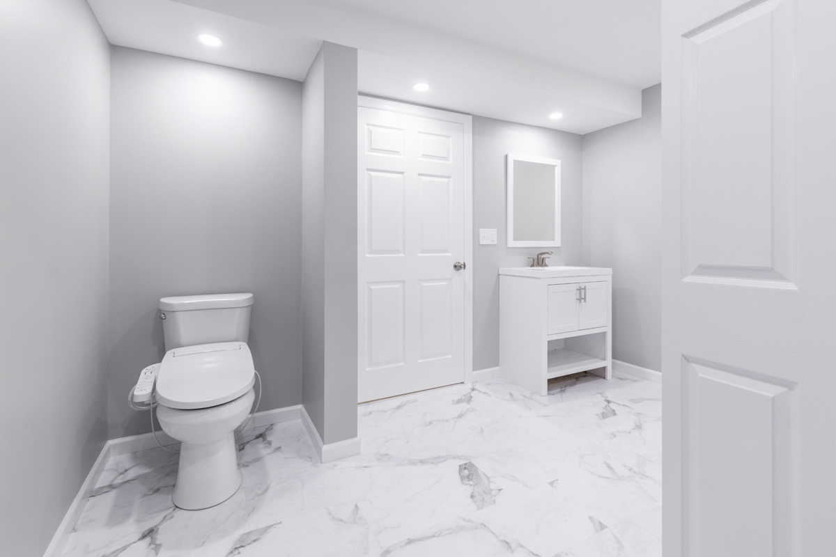 After basement remodeling at Smith Residence in Brookfield CT showing completed basement after flooring and finish work
