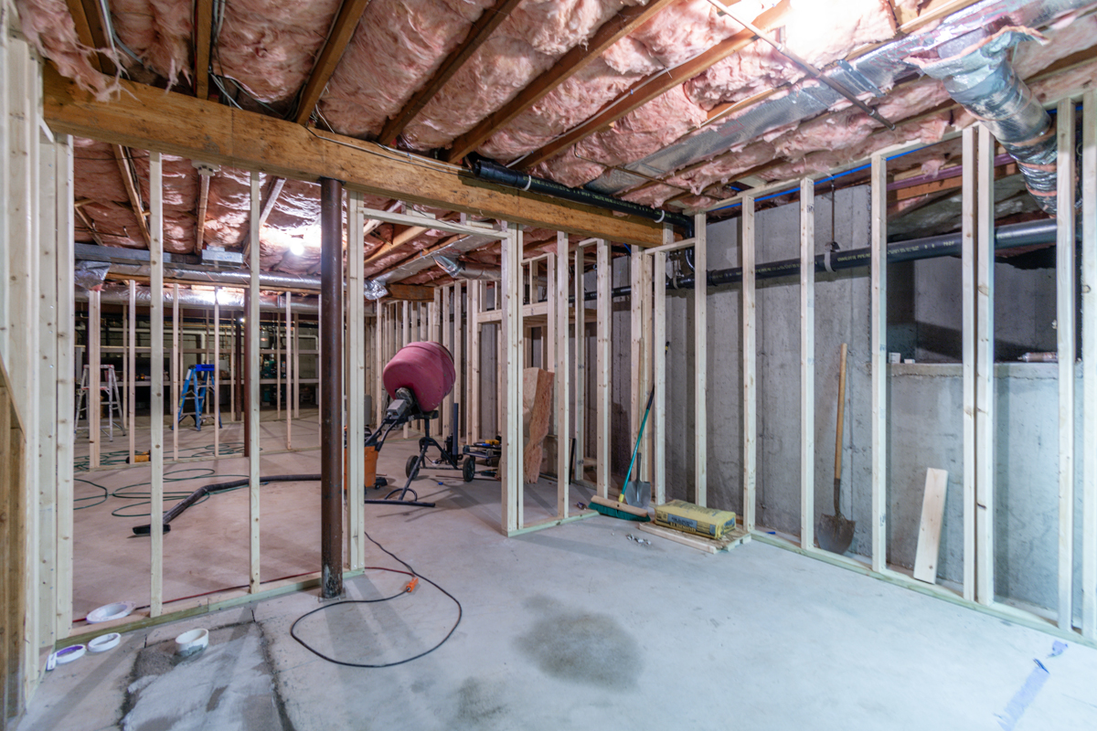 Before basement remodeling at Smith Residence in Brookfield CT showing basement before flooring and final finishes